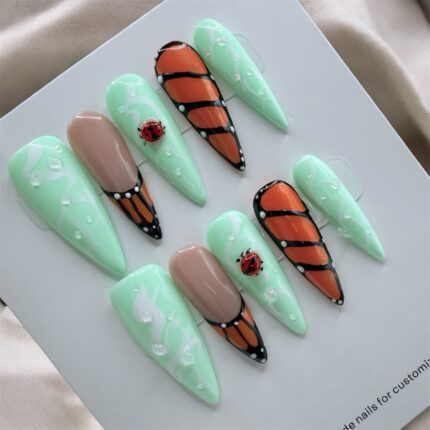 Mint Green And Ladybug Stiletto Nails