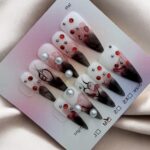 Y2K Stiletto Nails With Deep Red Tips
