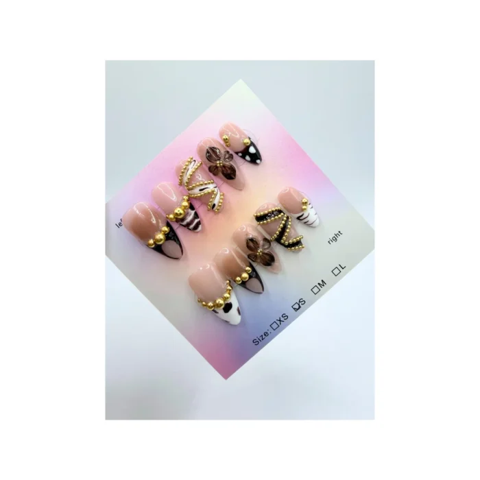 Designed with a nude base, brown and black abstract tips, elegant gold bead chain accents, and 3D translucent brown flower charms, this set blends modern art with feminine detail.