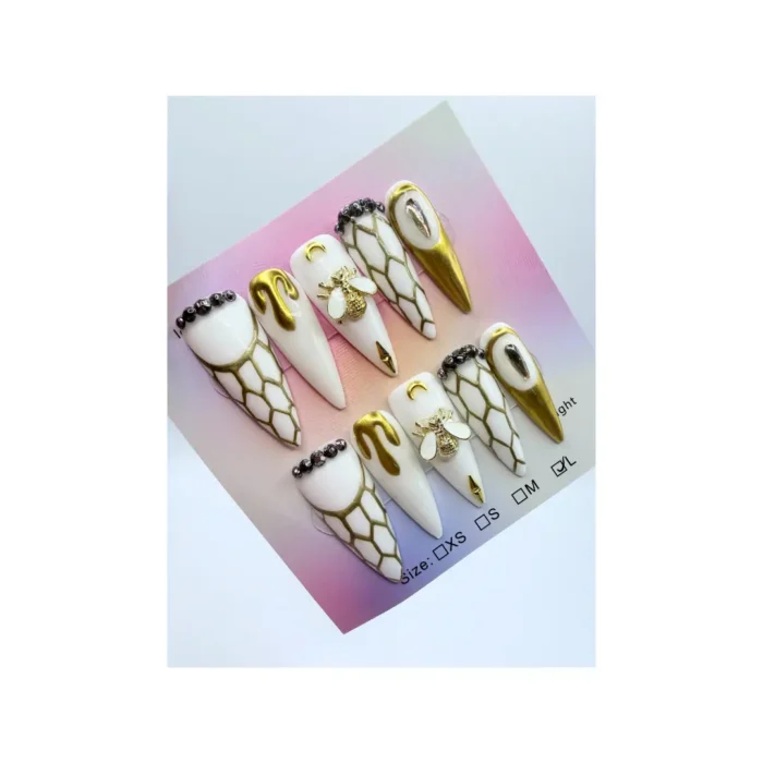 Handmade Long Stiletto Press-On Nails White Gold Snake Pattern 3D Bee Moon handmade long stiletto press-on nail set featuring a stunning white and gold hexagonal snake pattern inspired by honeycomb elegance