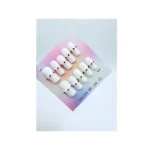 white square press-on nail manicure features a glossy finish with delicate white pearl and red rhinestone accents placed along the cuticle line for a refined, festive look.