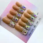 Handmade luxury square press-on nails with nude base and iridescent rhinestone French tips