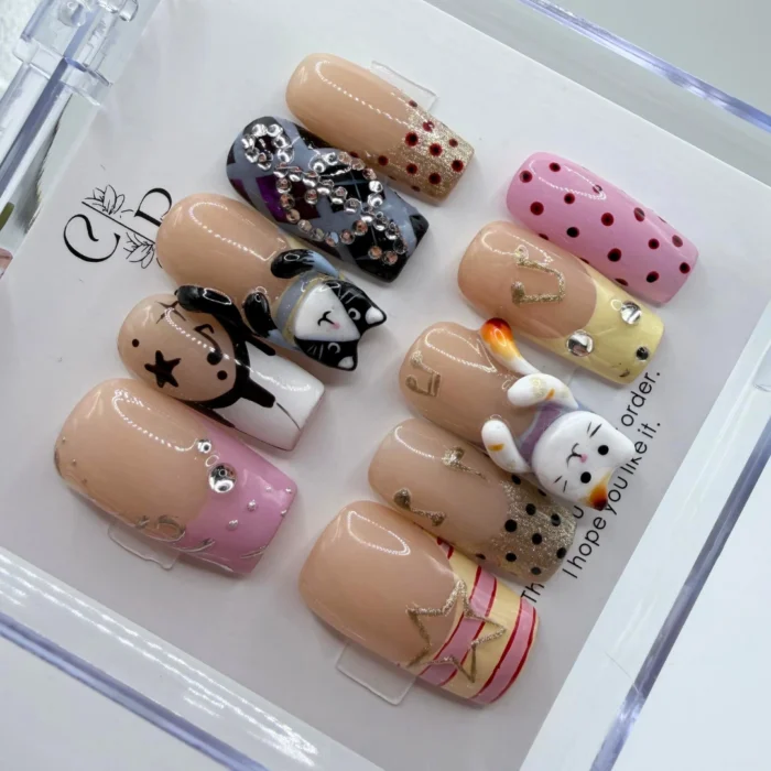 Hand painted 3d kawaii boba cat press on nails set with miniature sculpted bubble tea cups and cute kitten faces.