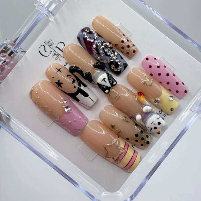 Handcrafted- 3D -Cat -and- Boba -Mismatched -Press-On -Nails Handmade 3d cat boba mismatched press on nails featuring cute miniature bubble tea cups and sleeping kitty details.