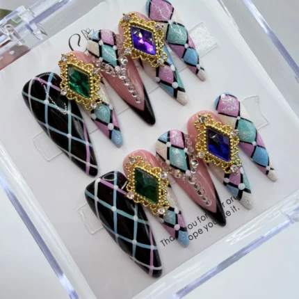 Handmade pastel harlequin press on nails featuring a soft diamond pattern with subtle glitter accents.